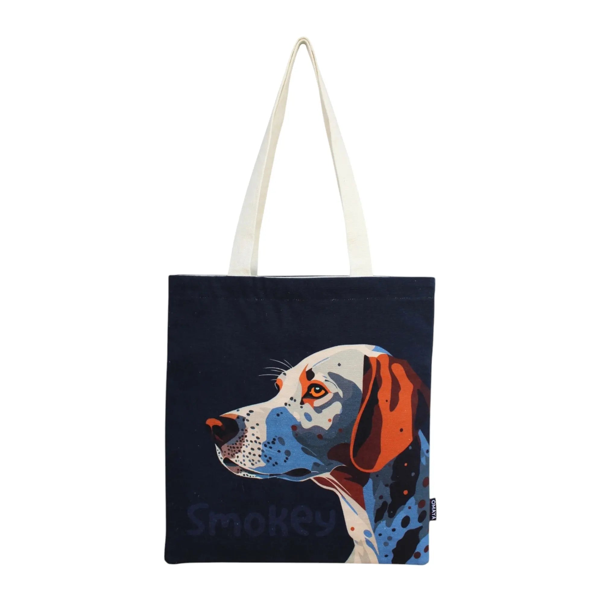 House of Omaya Design: A white and brown dog with orange ears and blue spots. The dog's name, "Smokey", is printed in white text below the dog. Product vendor